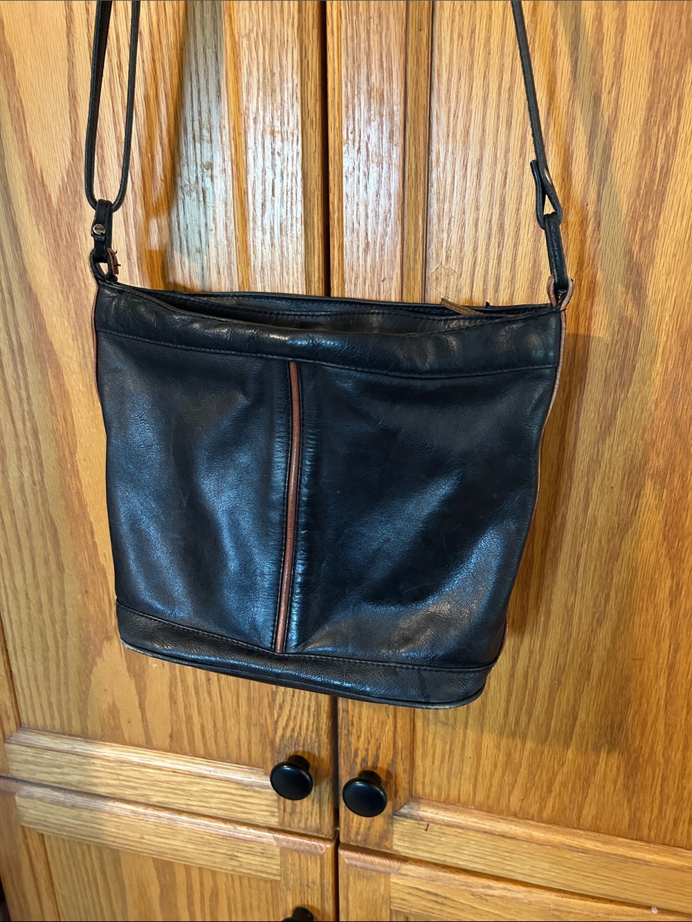 Slim Black Leather Crossbody with Subtle Brown Trim